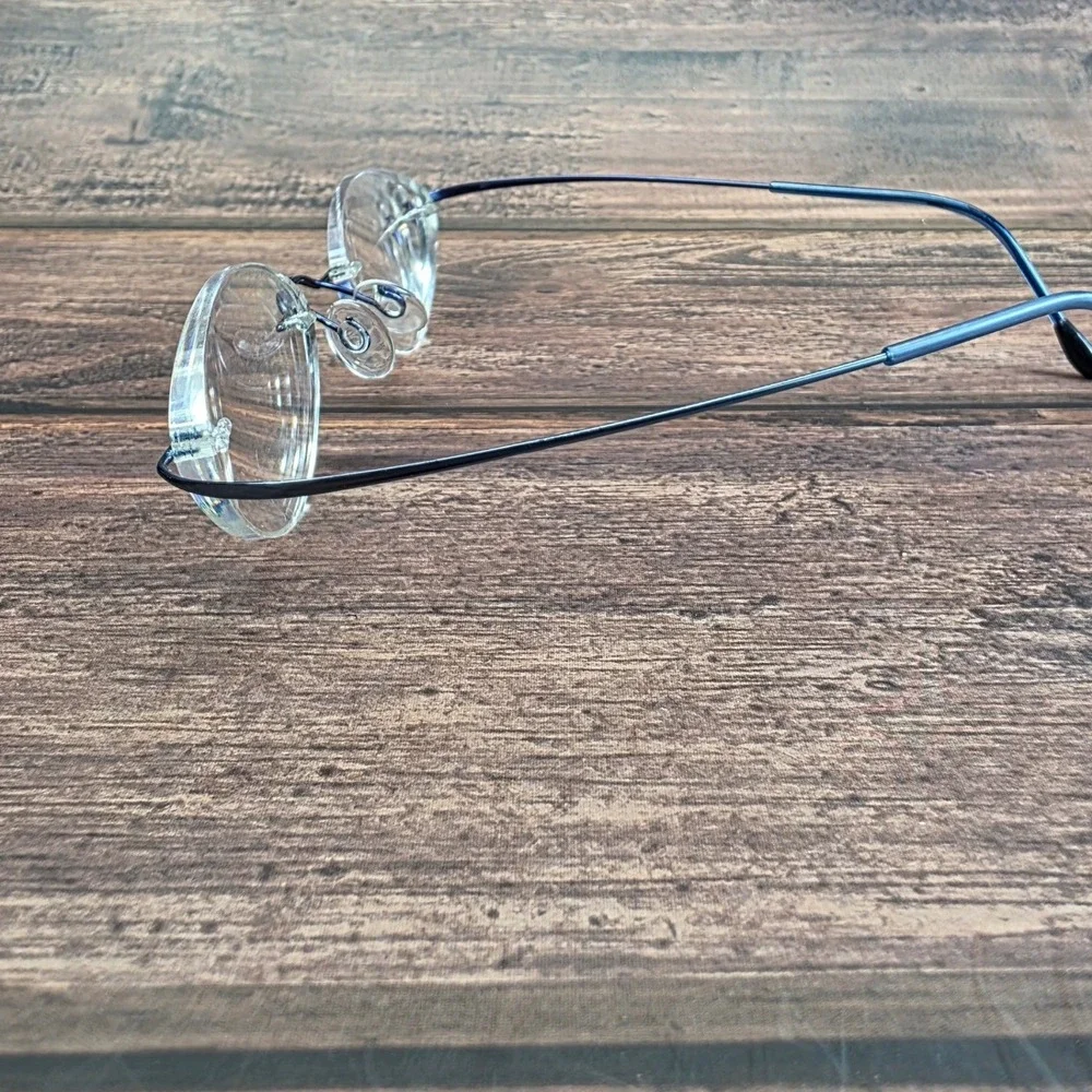 Silhouette M7395 Rimless Cat Eye Eyeglasses Navy Blue Minimalist Frames Austria
